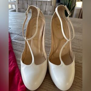 Christian Louboutin white pumps with ankle strap
